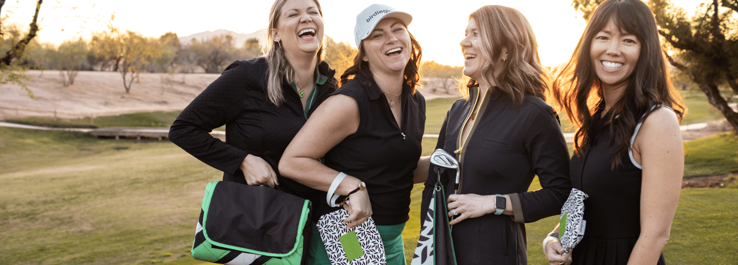 Women's enjoying a round of golf at sunset