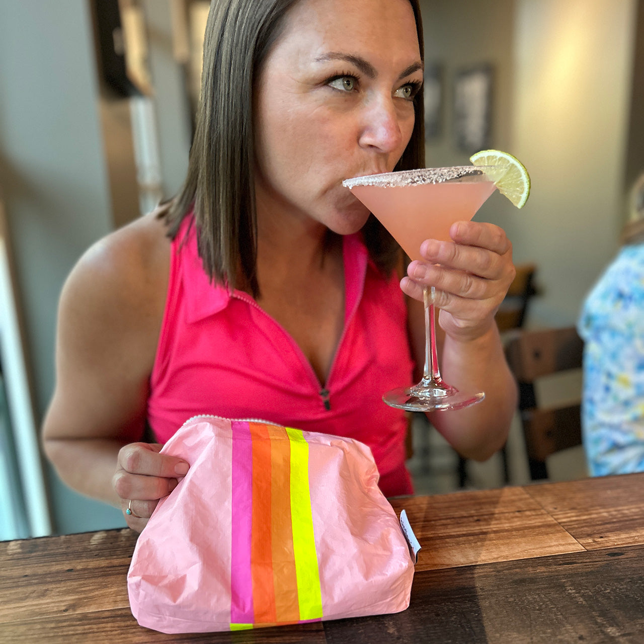 Woman Golfer with cute golf bag and summer drink
