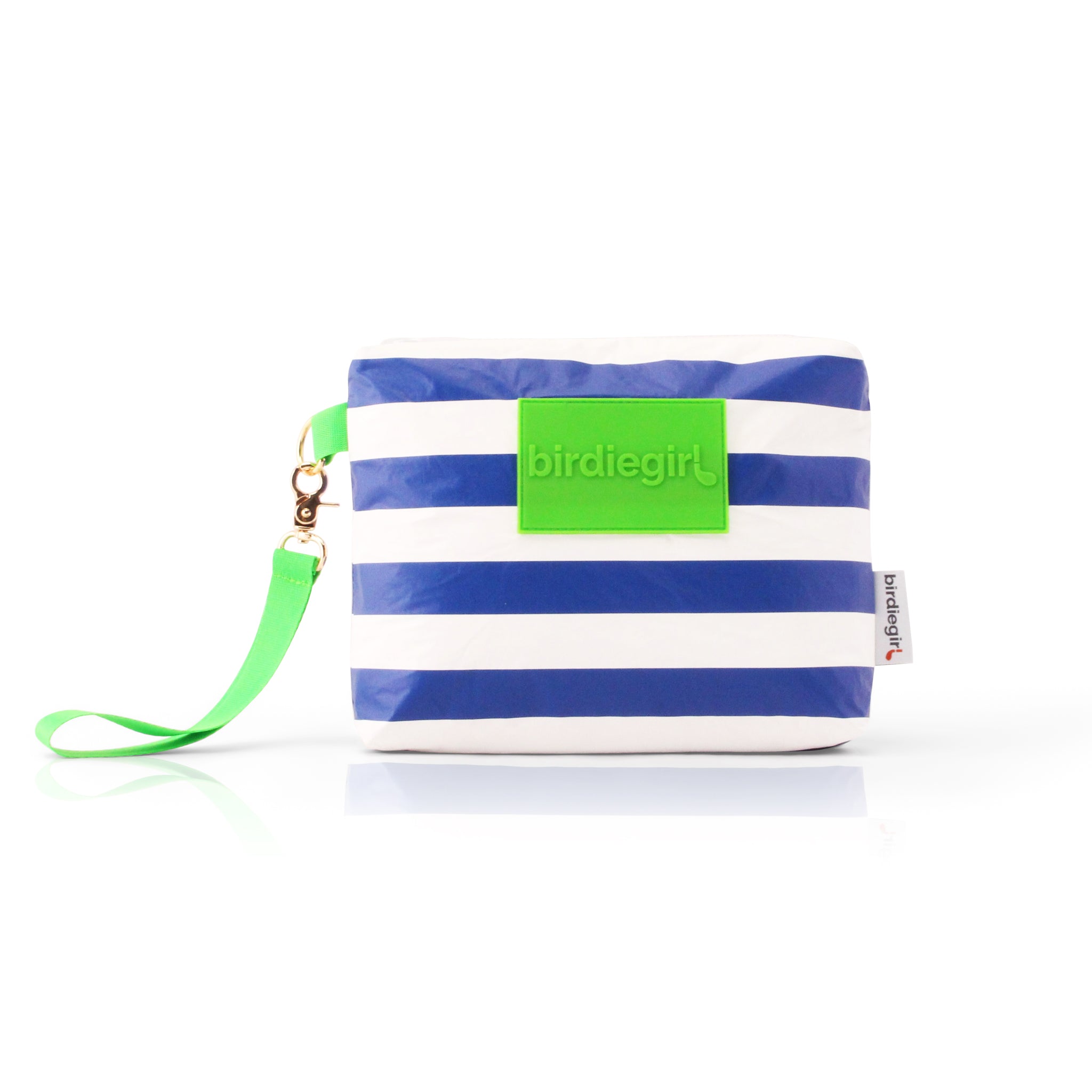 Wristlet-style accessory bag held by green strap on wrist